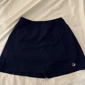 Women's Navy Blue Foray Golf Skirt with built in no ride shorts
